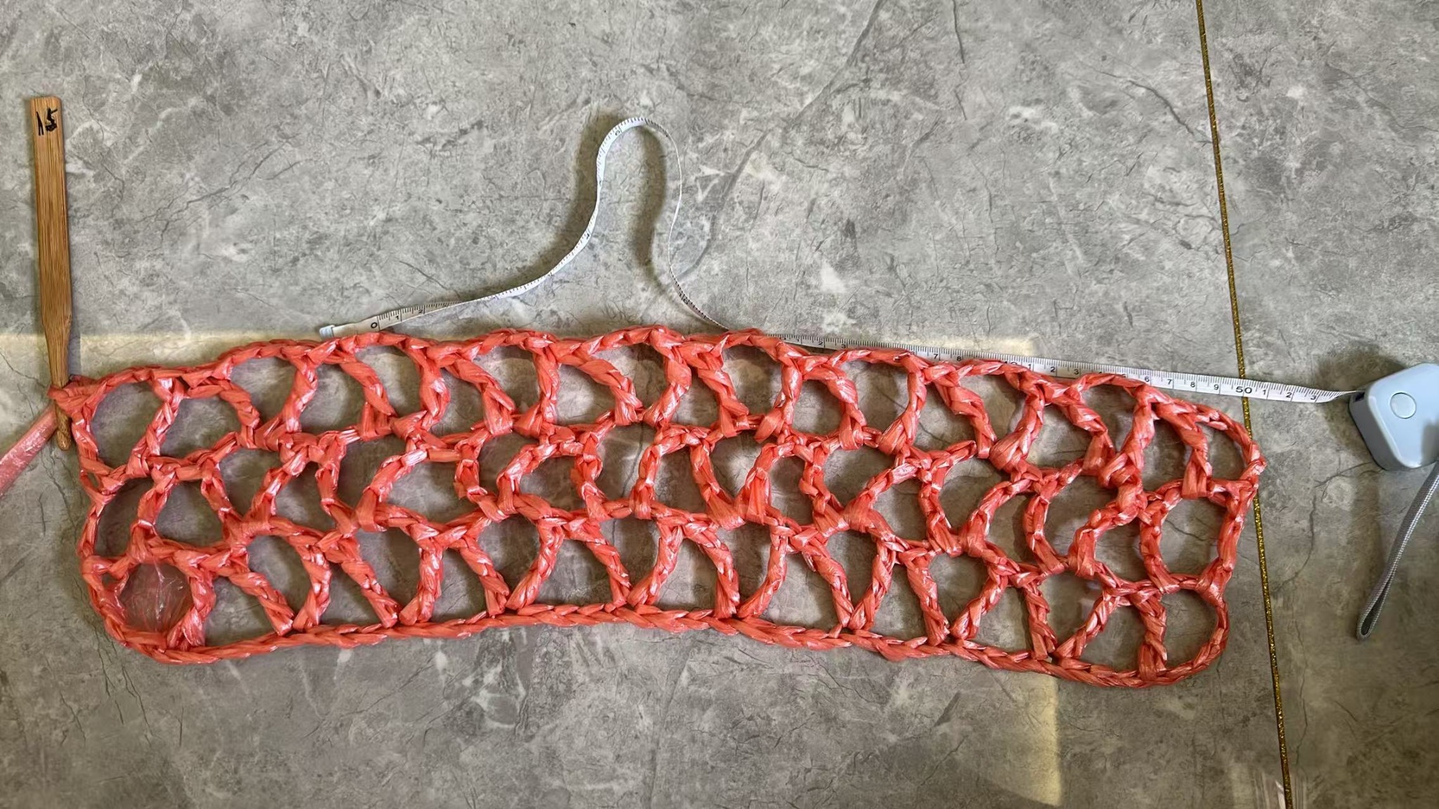 Open structure of the handwoven pink base